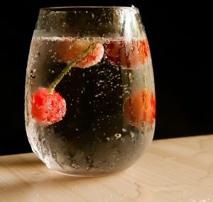 glass of water with fruit