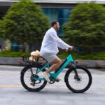 Man riding a bicycle with a basket